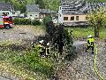 Langenhahner Feuerwehr verhindert greren Brandschaden: Tujahecke und Wiese in Brand