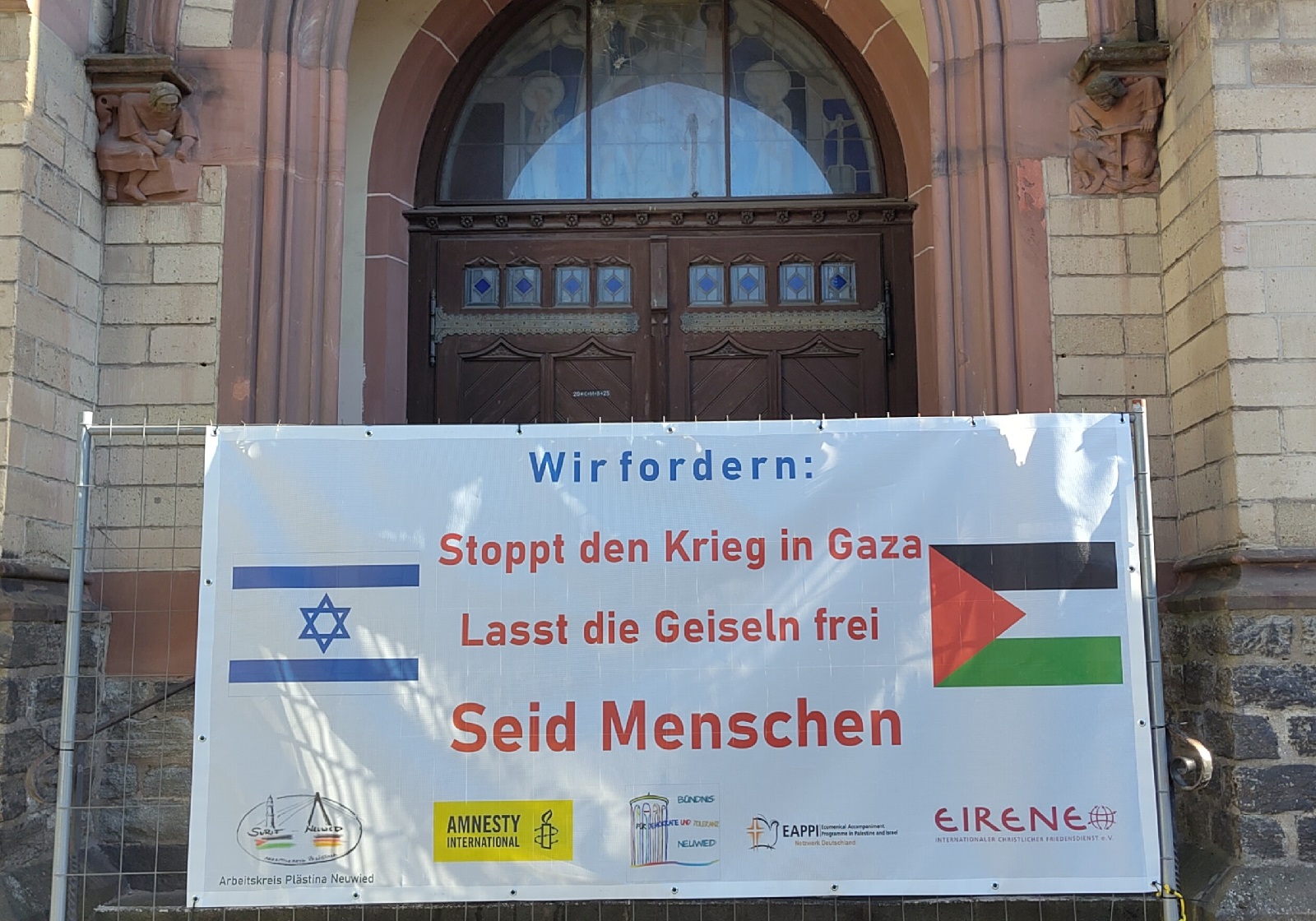 Plakat auf der Veranstaltung. (Foto: Josef Freise)